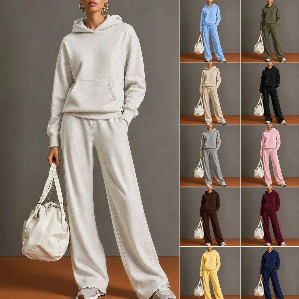 Model wearing a light-colored pullover hoodie and matching wide-leg pants, with additional color options shown.