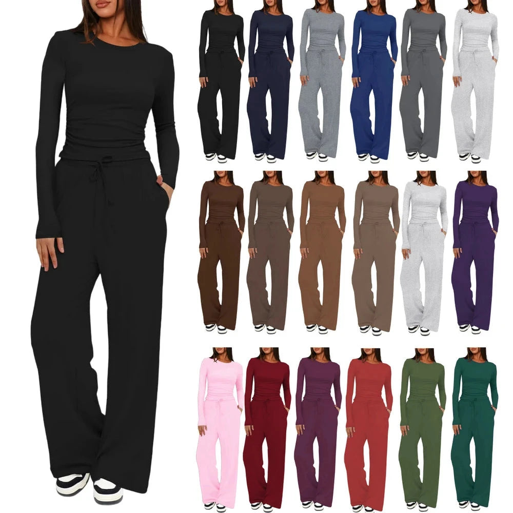 Black long-sleeve top and matching drawstring wide-leg pants, with additional color options shown.