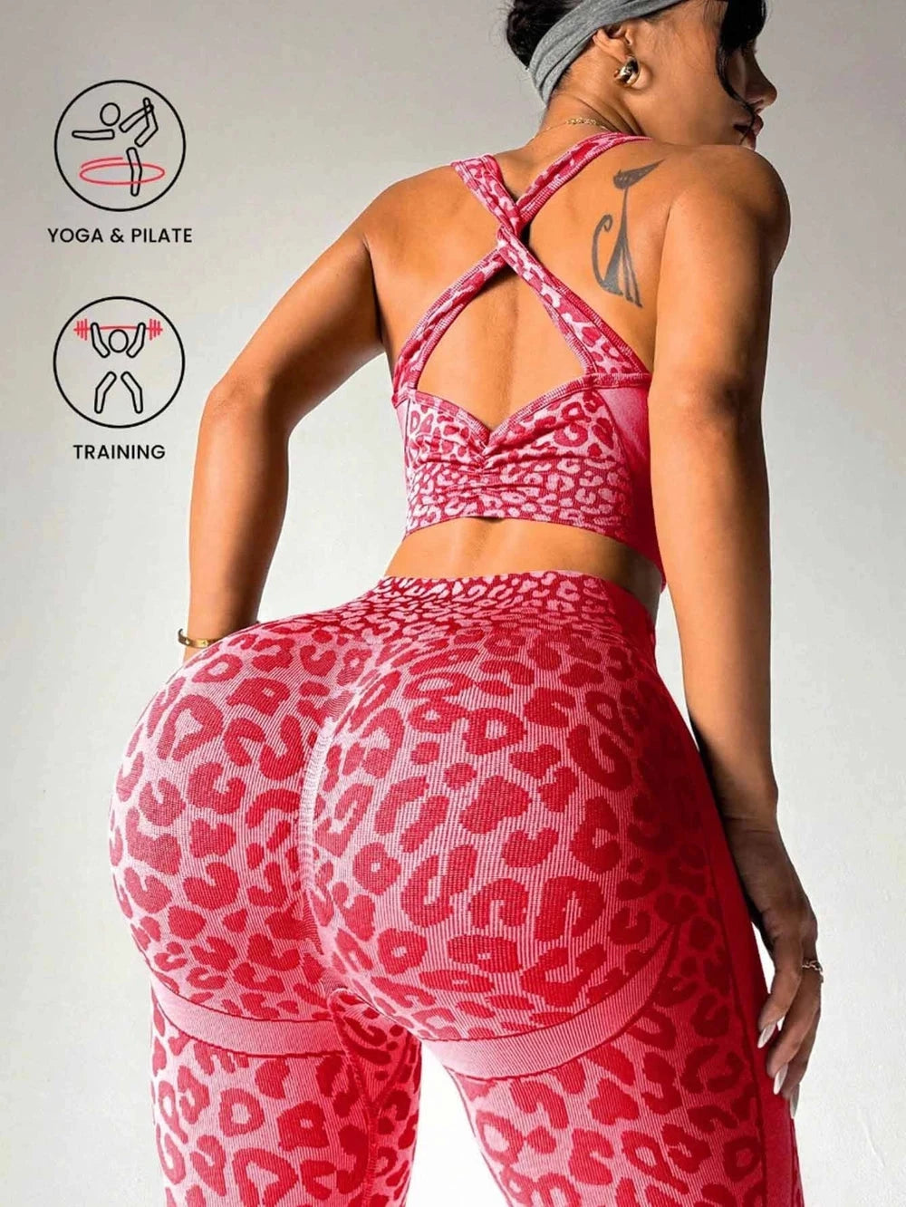 A woman shown from the back wearing a pink leopard-print sports bra and matching high-waisted leggings with sheer mesh side panels. The image includes two circular icons on the left with text reading 'YOGA & PILATE' and 'TRAINING'.